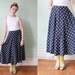 vintage navy blue polka dot midi length skirt