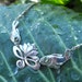 SPECIAL LISTING for TANYA - Fish & Lotus Necklace with pale blue topaz