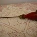 Vintage red handled ice pick--chippy and rusty