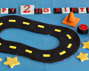 Fondant Race Track, Wheels, Construction Cones, Stars and Happy Birthday Message for Decorating a Birthday Cake