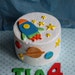 Fondant Rocket, Stars and Planet Cake Decorations for a Space Party Birthday Cake