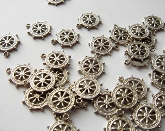 20 pieces of 12 mm vintage Ships wheel charms silver tone HC032.
