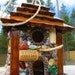 Rustic Star Birdhouse ready to hang outdoors