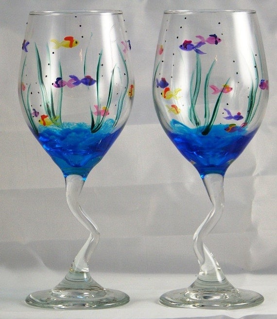 Items similar to hand-painted fish wine glasses on Etsy