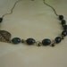 Antique brass and serpentine necklace with leaf