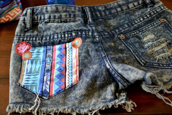 ripped jeans shorts with tribal patch by ShopPilgrimVintage