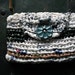 Plyarn handbag with flower button