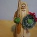 Hand carved minature Santa with Wreath
