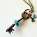 Blue on Ivory Lampwork Bead on Vintage Skeleton Key Necklace