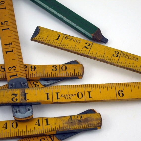 Vintage folding rulers and a Yale lock