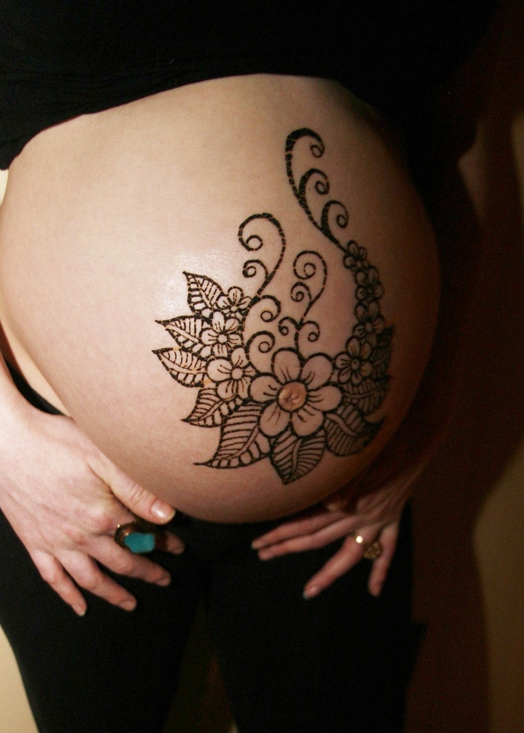 hip tattoos and pregnancy