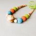 Bright Nursing Necklace with a big mountain ash wood bead and crochet beads