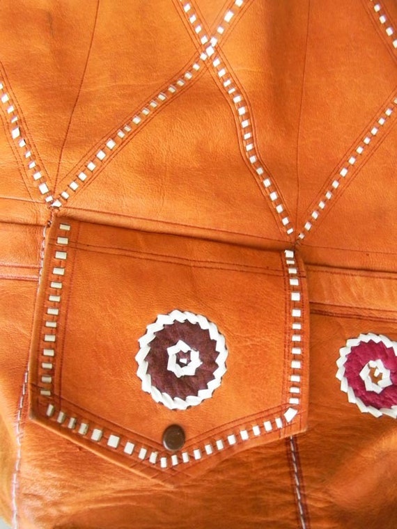 aztec leather backpack