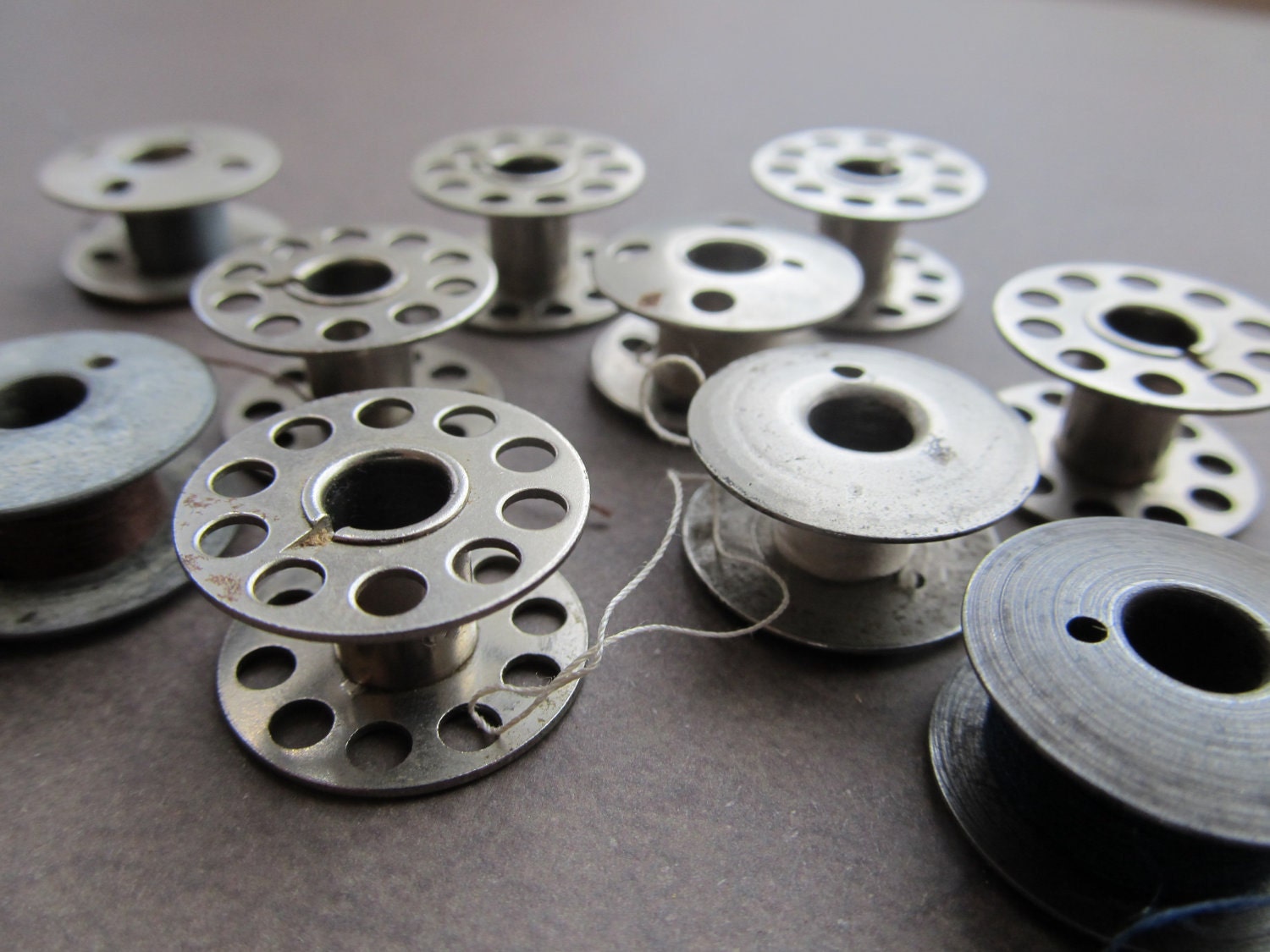 2 Vintage Metal Bobbins