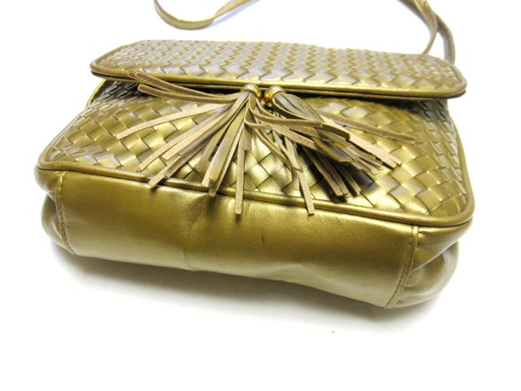 gold tassel bag