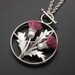 Thistle motif silver pendant