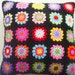 the rainbow granny square cushion cover