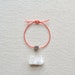 Grounded Bracelet in Coral- Braided Linen and Agate Cube