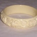 vintage bracelet carved flowers lucite