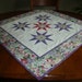 Quilted table square in Spring colors