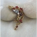 Steampunk Ear Cuff In Antique Brass Color With Garnet