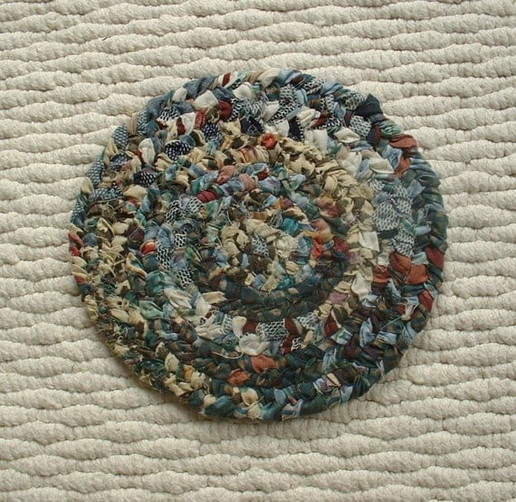 Braided Rug Trivet or Coaster made of coiled cotton. Rag