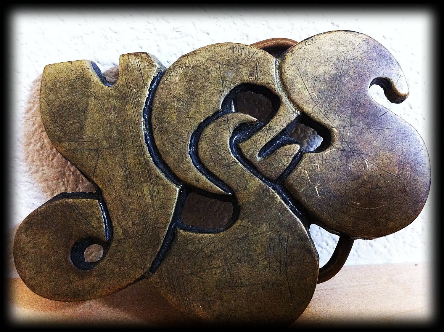 Rare 1974 YES solid brass belt buckle.