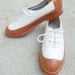Brown and White Oxfords size 7