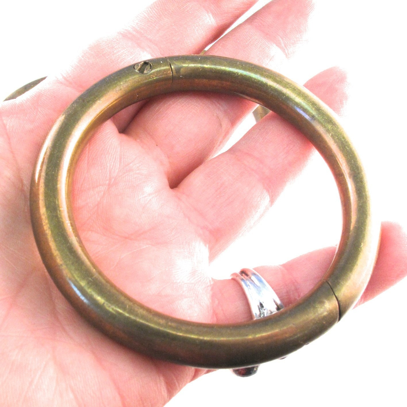 1 BULL NOSE RING. brass ring . self piercing . vintage.