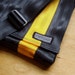 Seatbelt Messenger Bag in Black and Gold