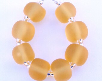 Amber handmade lampwork beads - set of 8 pale orange etched matt finish beads