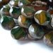 Czech Pressed Glass Beads Green and Ochre windows 10mm 7 pcs