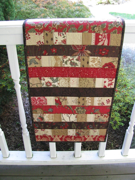 Items similar to Jelly Roll Quilted Table Runner Browns and Deep Red