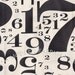 Half Yard of Circa 1934 Chaplin Numbers in Black, Cosmo Cricket for Moda Fabrics, 100% Cotton Fabric