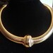 Three piece Vintage AVON Choker pendant pierced Earrings Gold tone Brooch Swarovski Encrusted stones original Box
