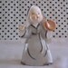 Vintage Ceramic Nun Figurine Playing Baseball at Vintage Heist