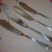 4 Vintage Silverplate Master Butter Knives, Each Different Pattern, Circa 1920's-1940's