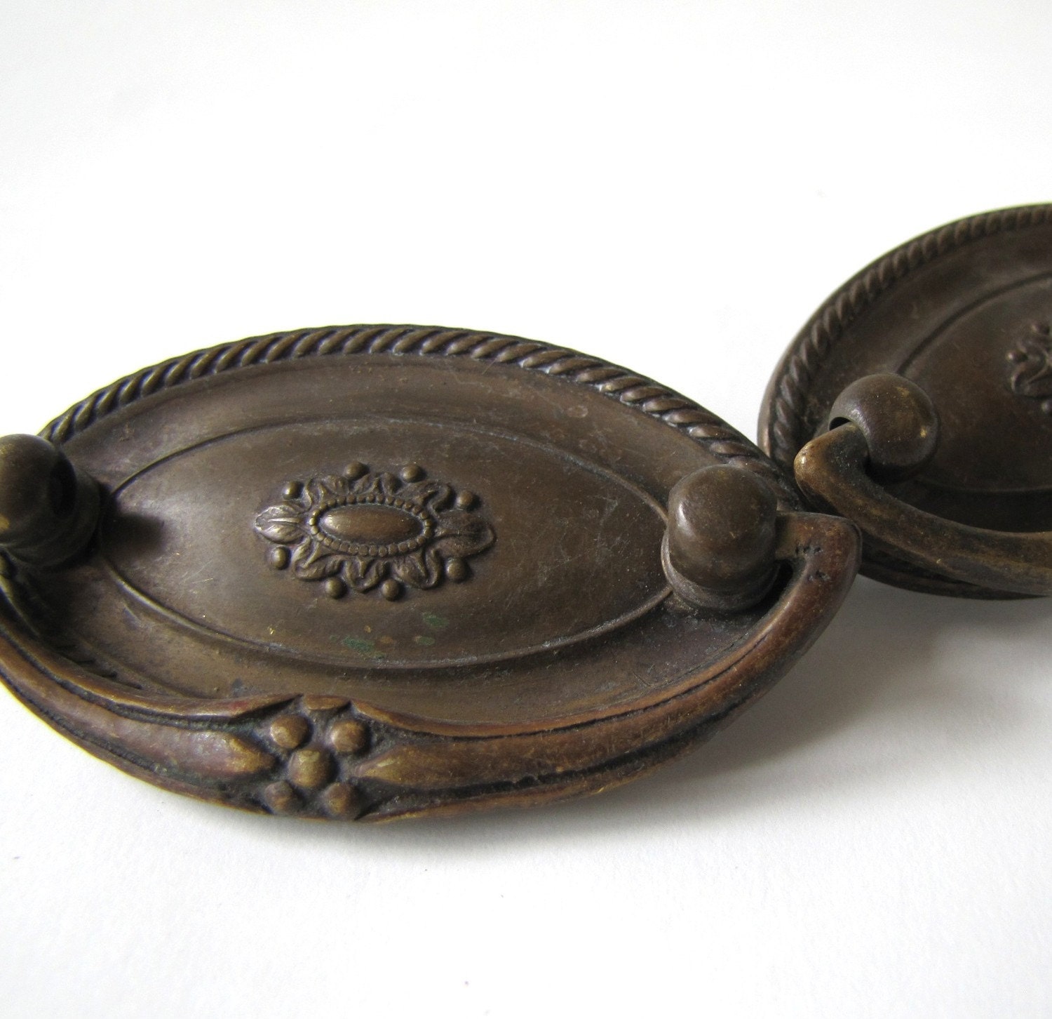 two elegant oval vintage drawer pulls