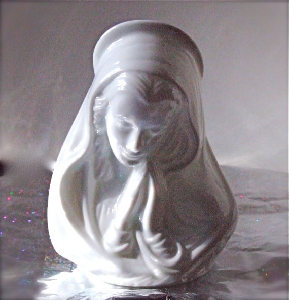 The candle holder Virgin Mary in Prayer