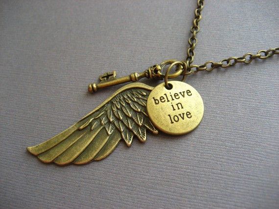 Items similar to Antique Bronze Angel Wing Necklace with Believe in ...