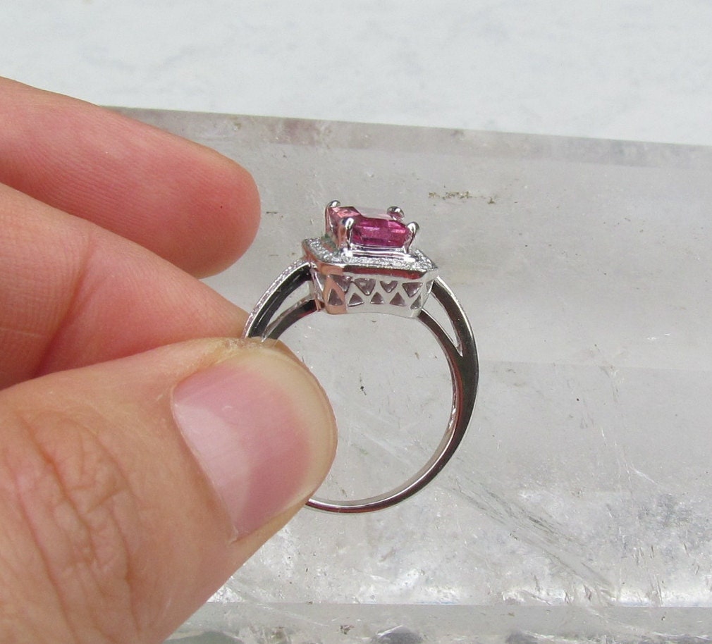 emerald cut pink sapphire ring