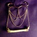 Bone Thugz Brooch in gold