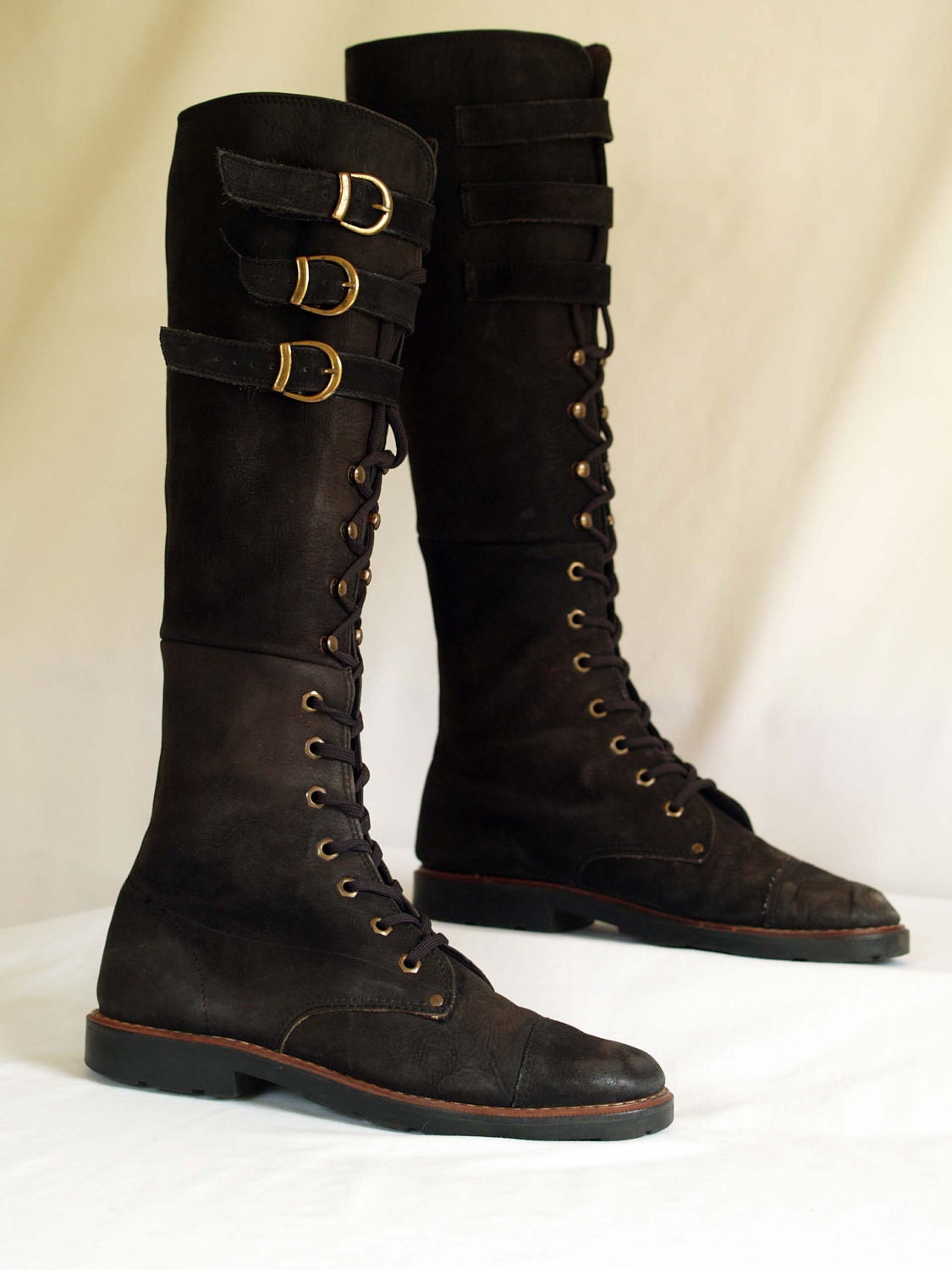 vintage knee high lace up military boots. combat boots with