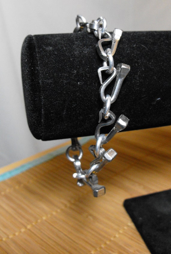 Horseshoe Nail Bracelet with silver wire links by JKnotions