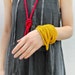 Yellow knitted necklace or bracelet