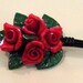 red roses petite bouquet brooch