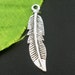 10 Silver Metal FEATHER CHARMS or Pendants