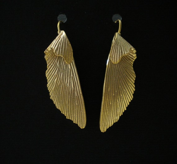 Items similar to Matte Gold Angel Wing Earrings on Etsy