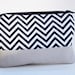 wristlet clutch in black and white chevron with gray bottom by rouge and whimsy