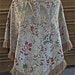 Very Unique 1960's or 1970's Poncho/Cape in cream tapestry, velvet fabric with muted flowers and fringe bottom - one size fits all
